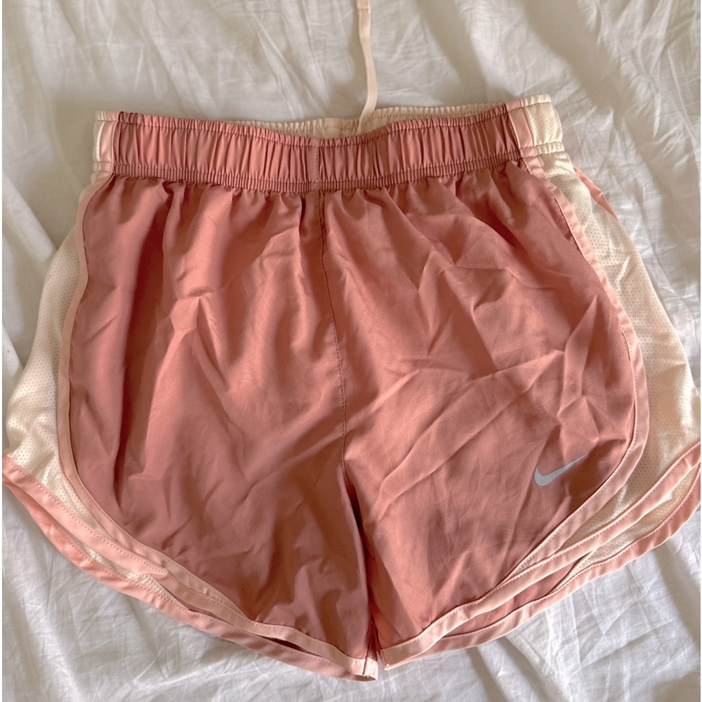 Light pink Nike sports shorts